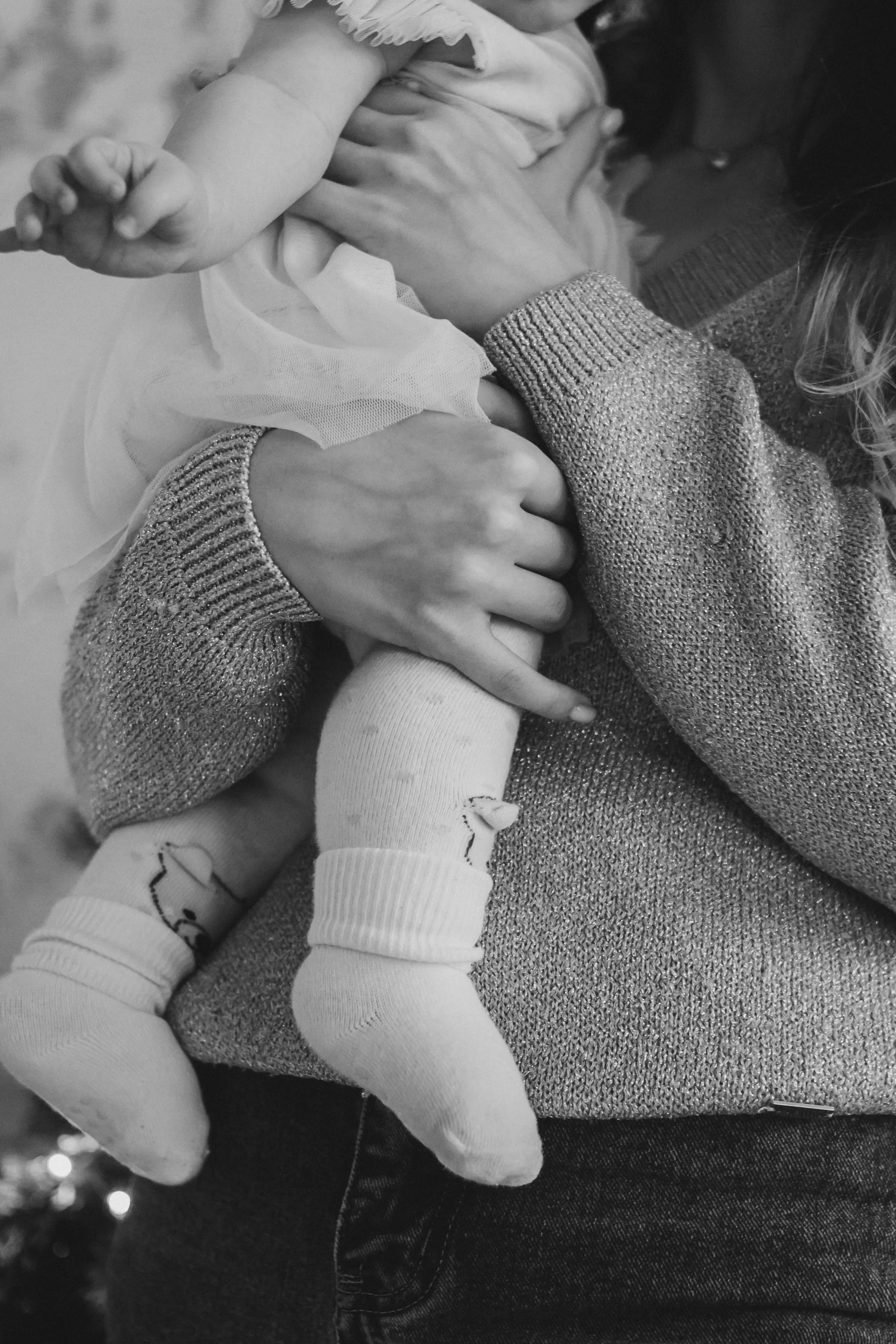 Mother holding a baby close